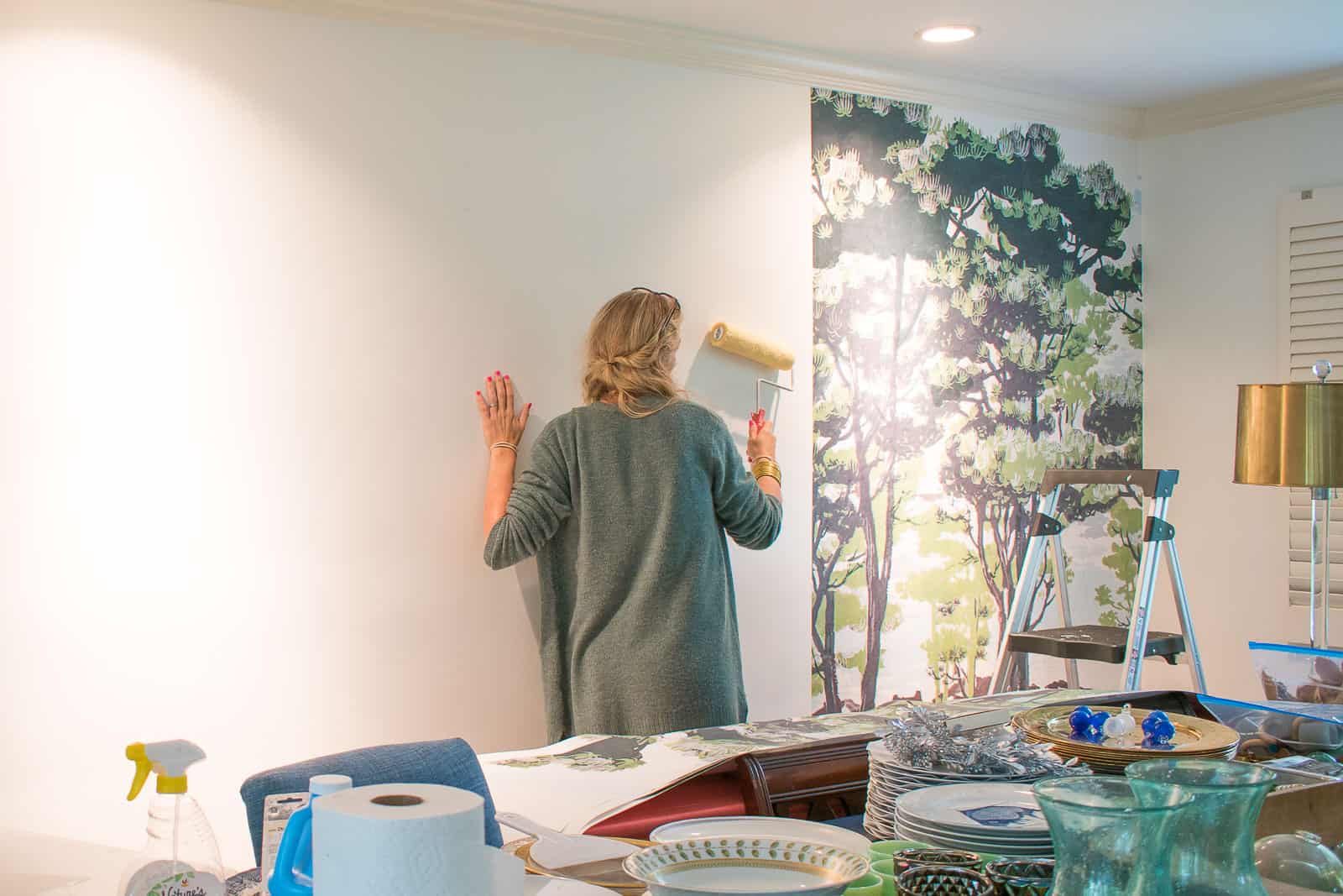 installing mural in dining room