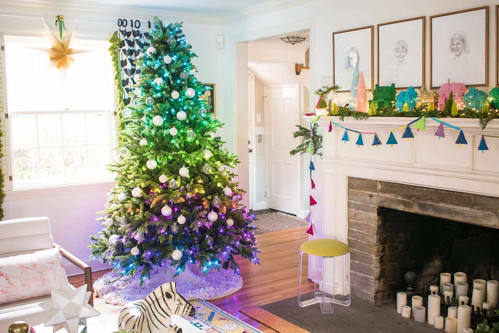 Rainbow Mantel And Christmas Tree With Colored Lights At