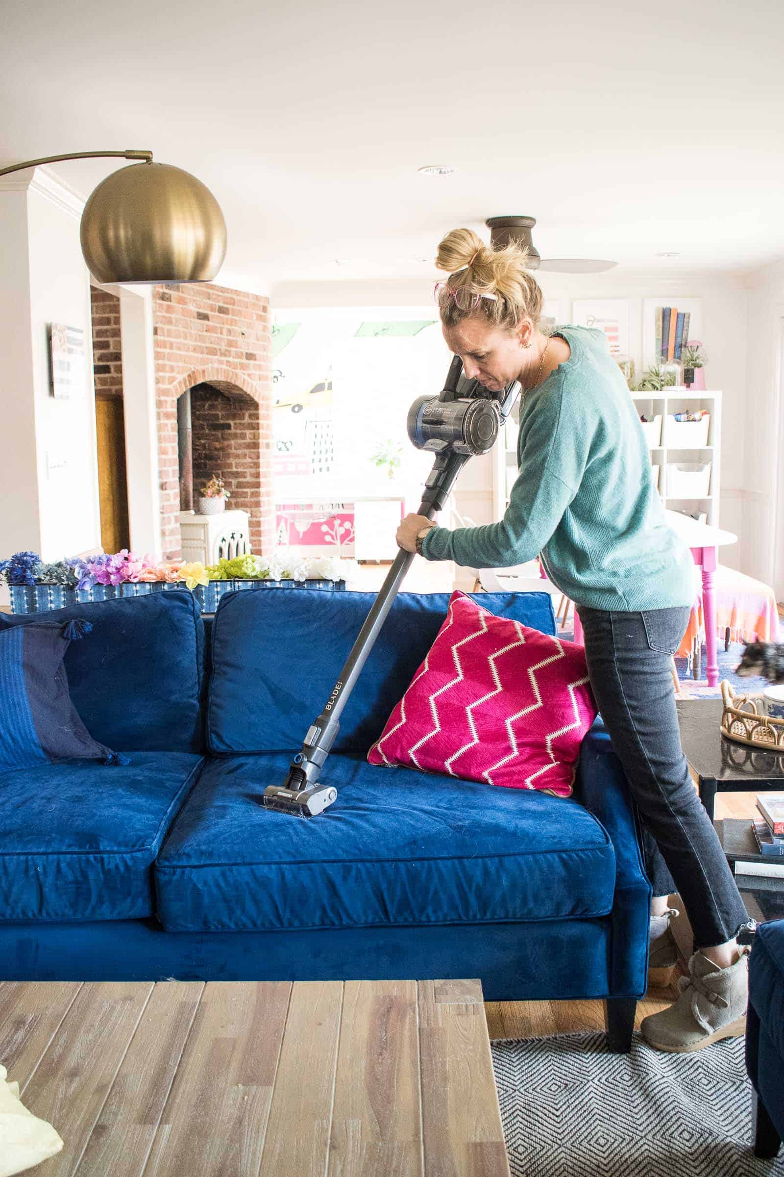 vacuuming up the dog hair