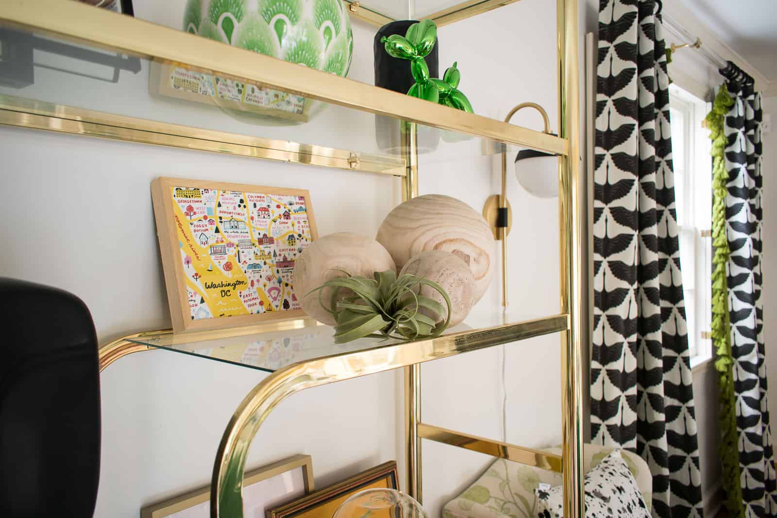 accessories on brass shelf