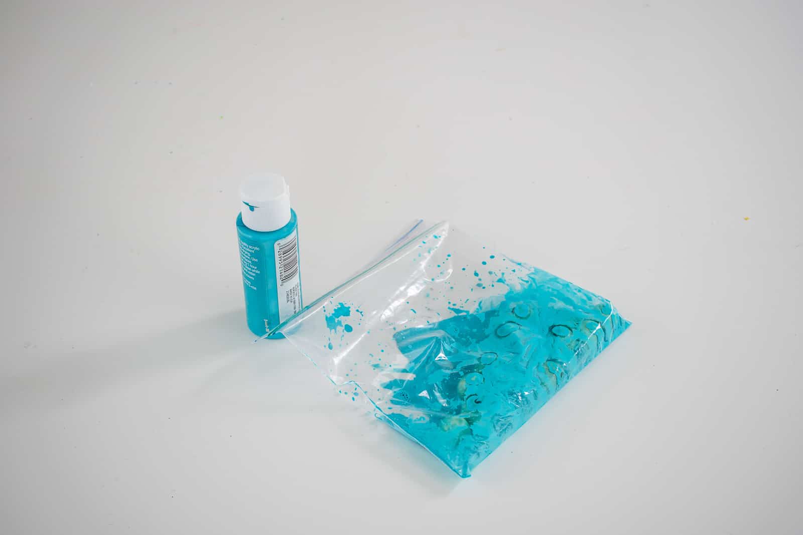 place beads into ziplock bag