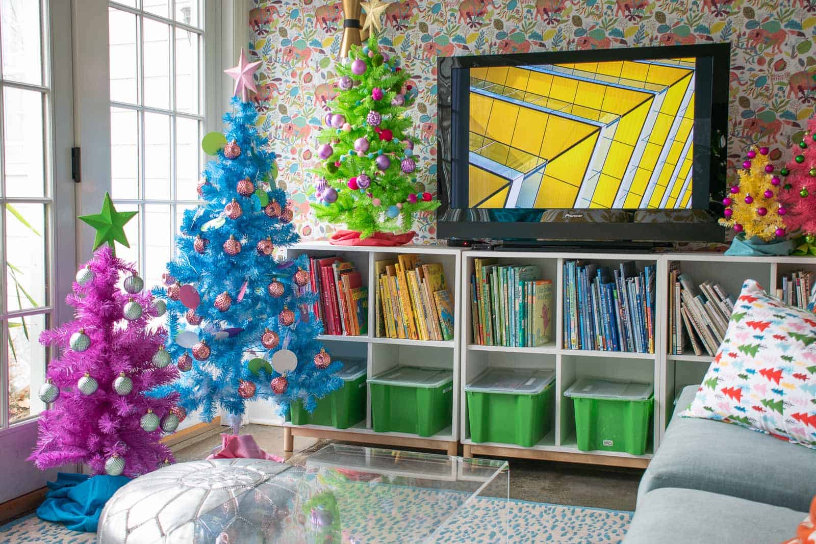 colorful shatterproof ornaments on rainbow trees