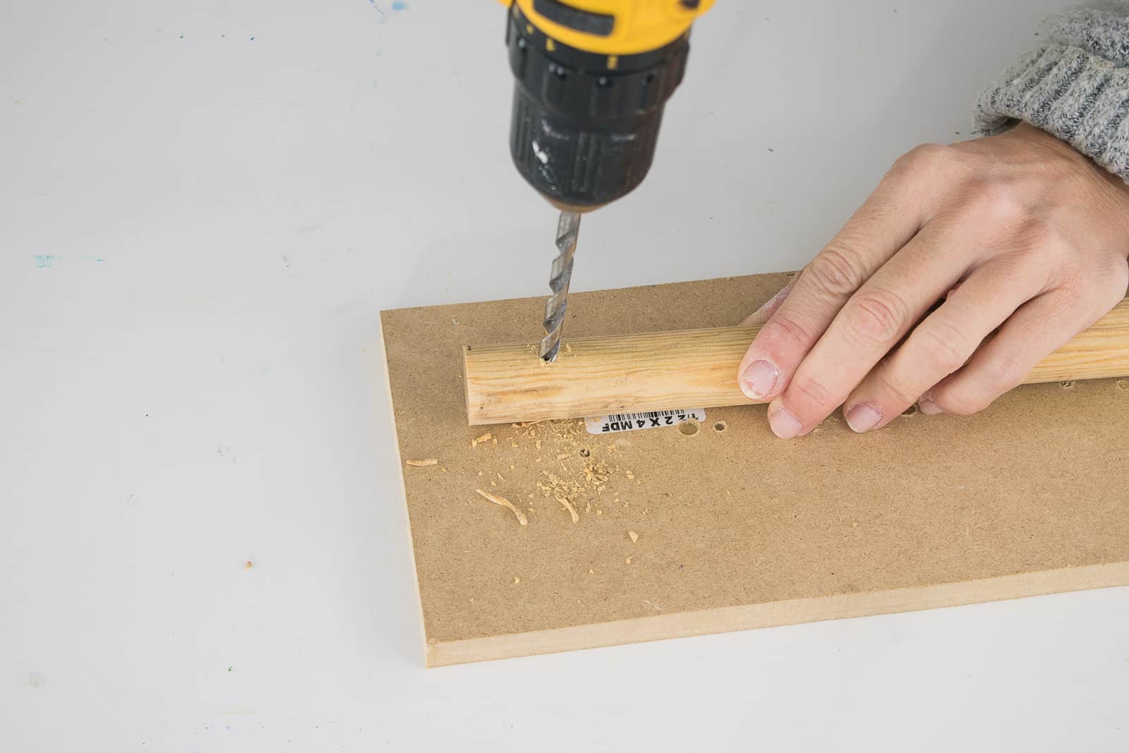 drill holes in dowel