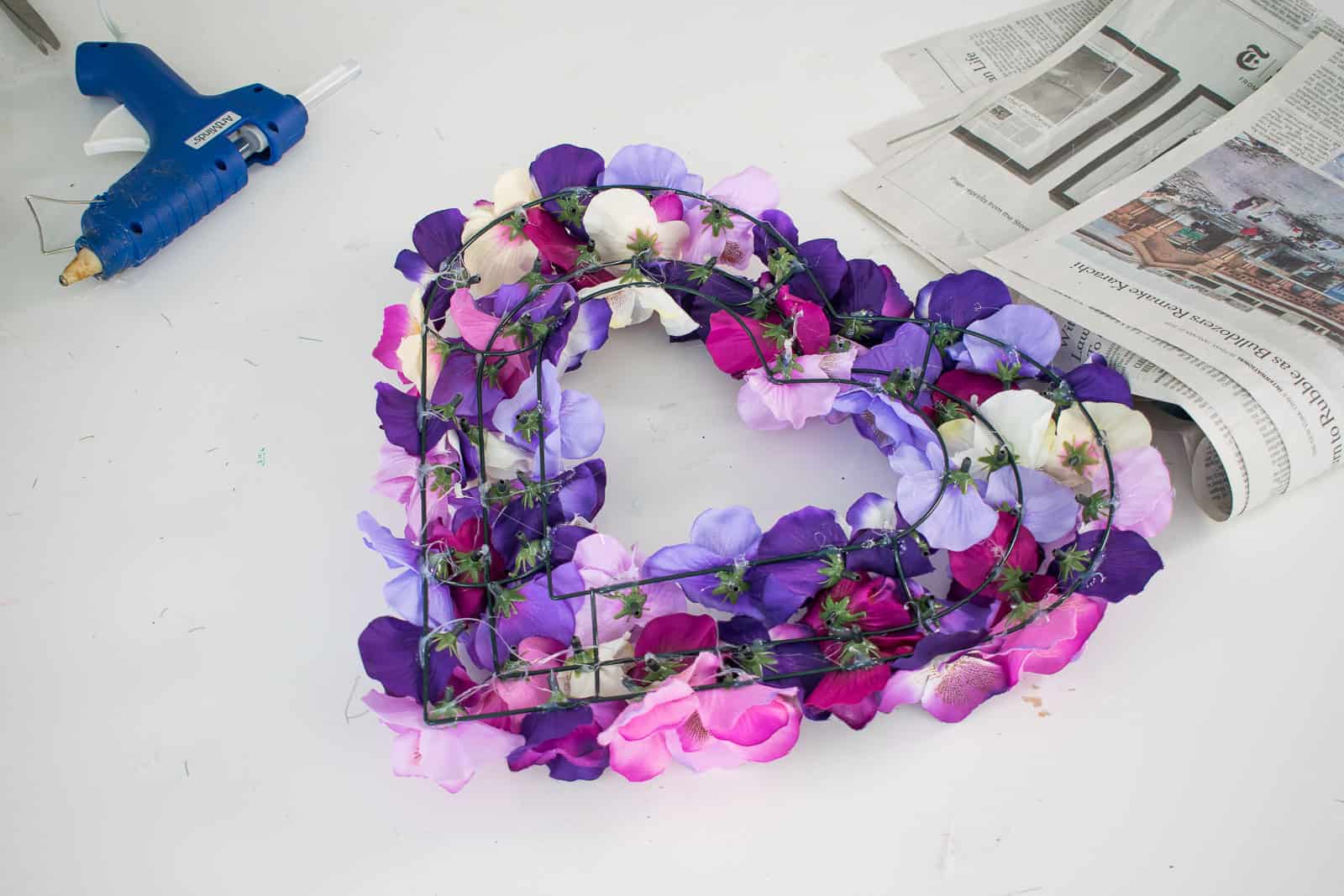 add flowers to wreath