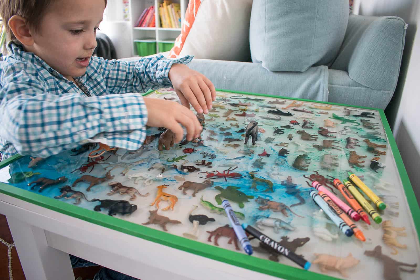 boy playing at epoxy table