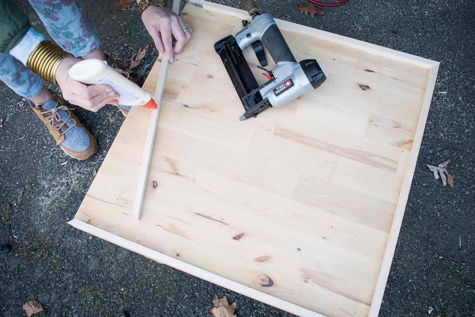 glue and nail trim onto sides of table