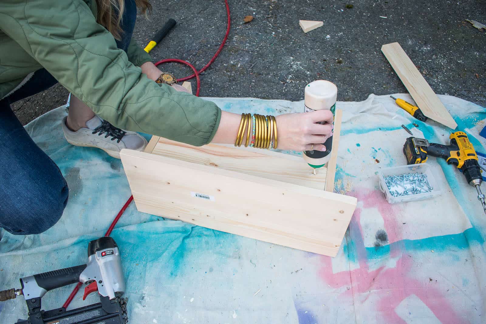 use wood glue and brad nails to attach angles skirt