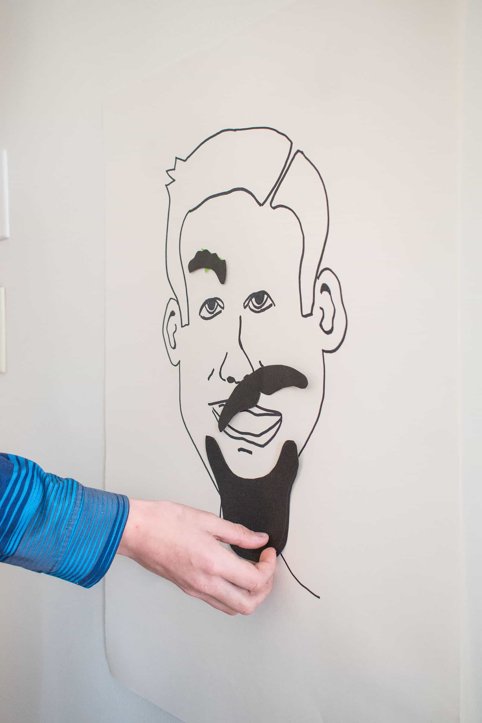 pin the facial hair on the man