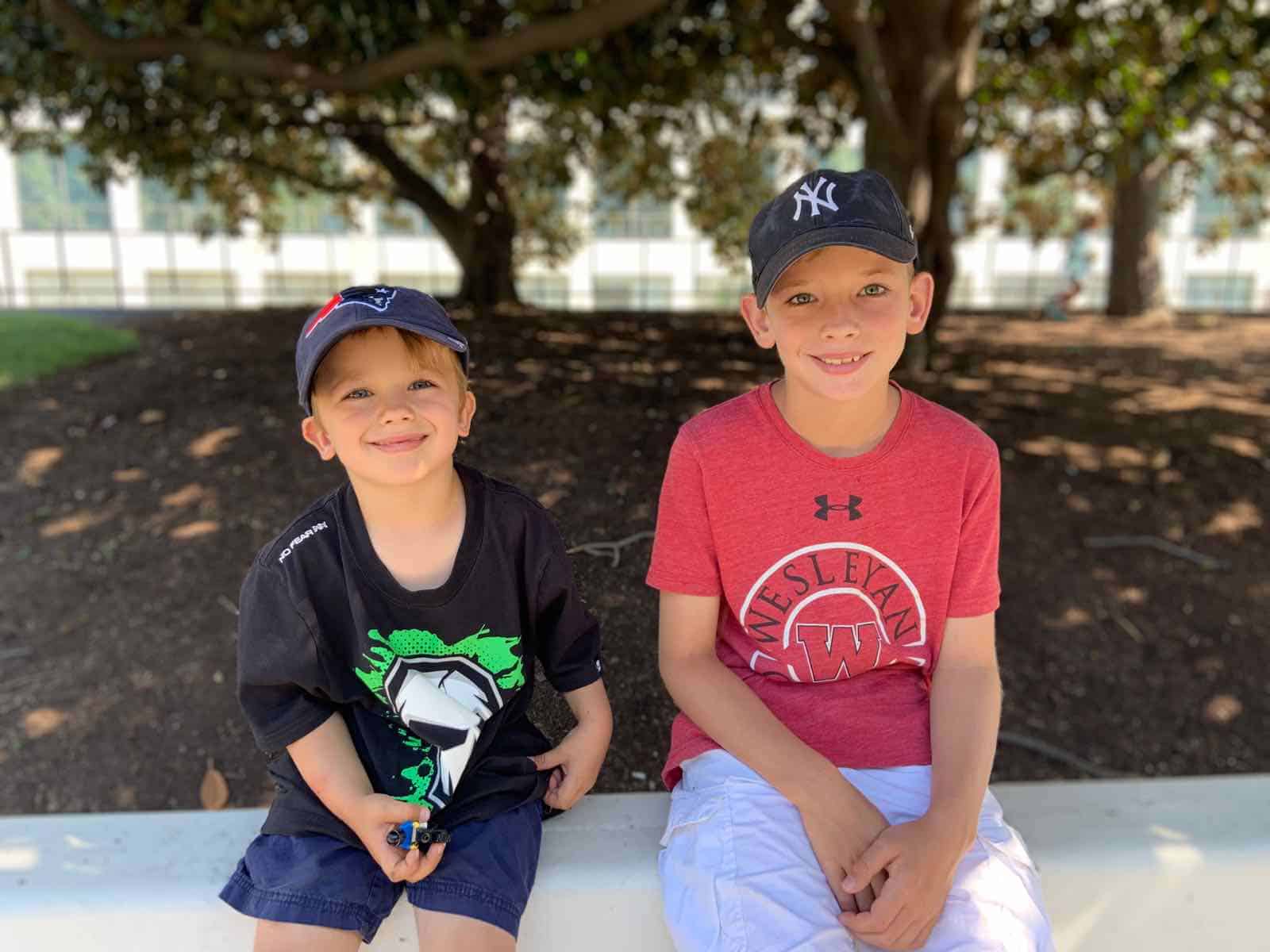 two boys sitting together