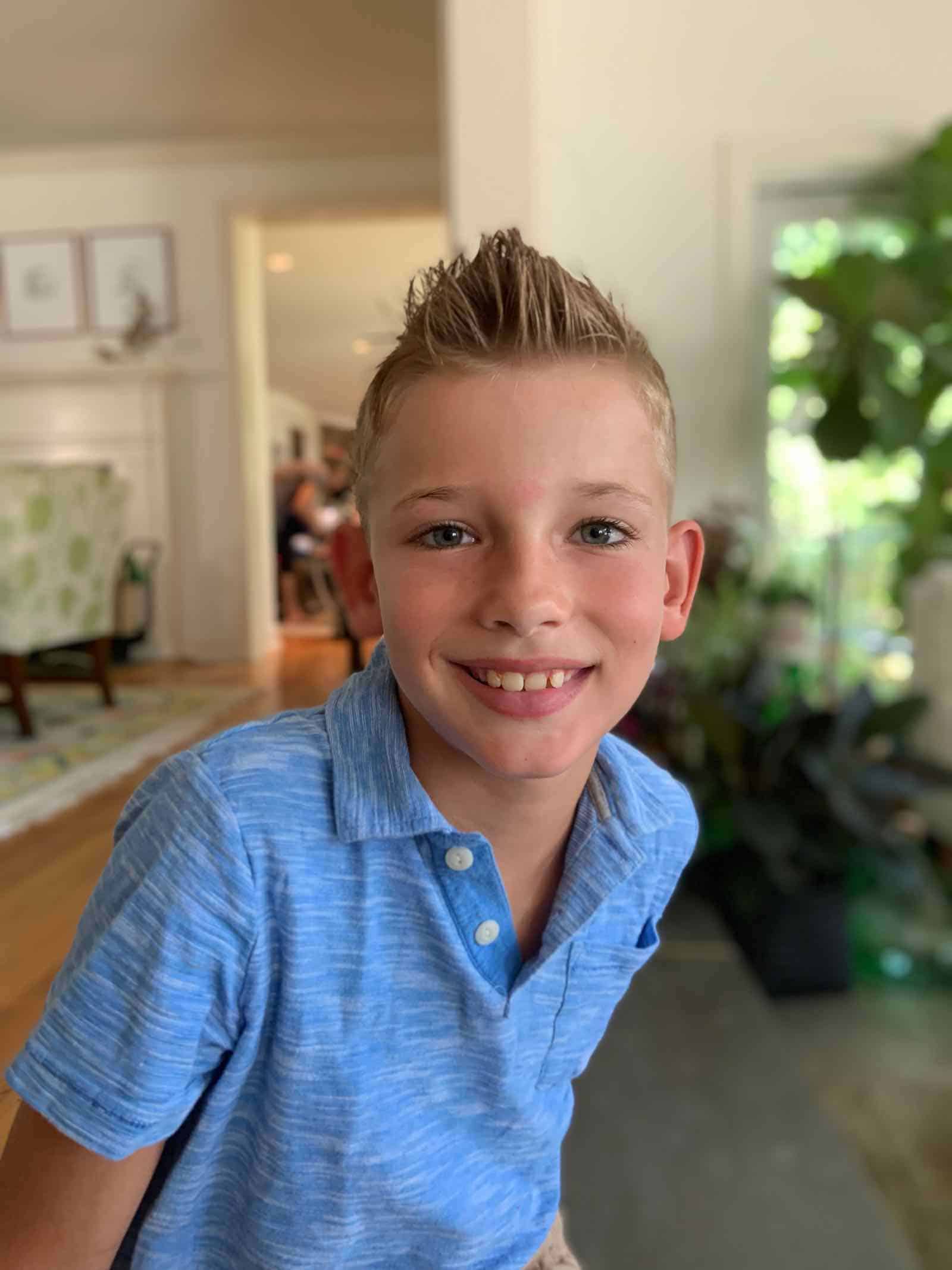 son with new haircut