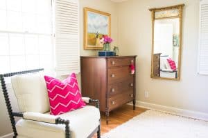 adding pink to one end of the bedroom
