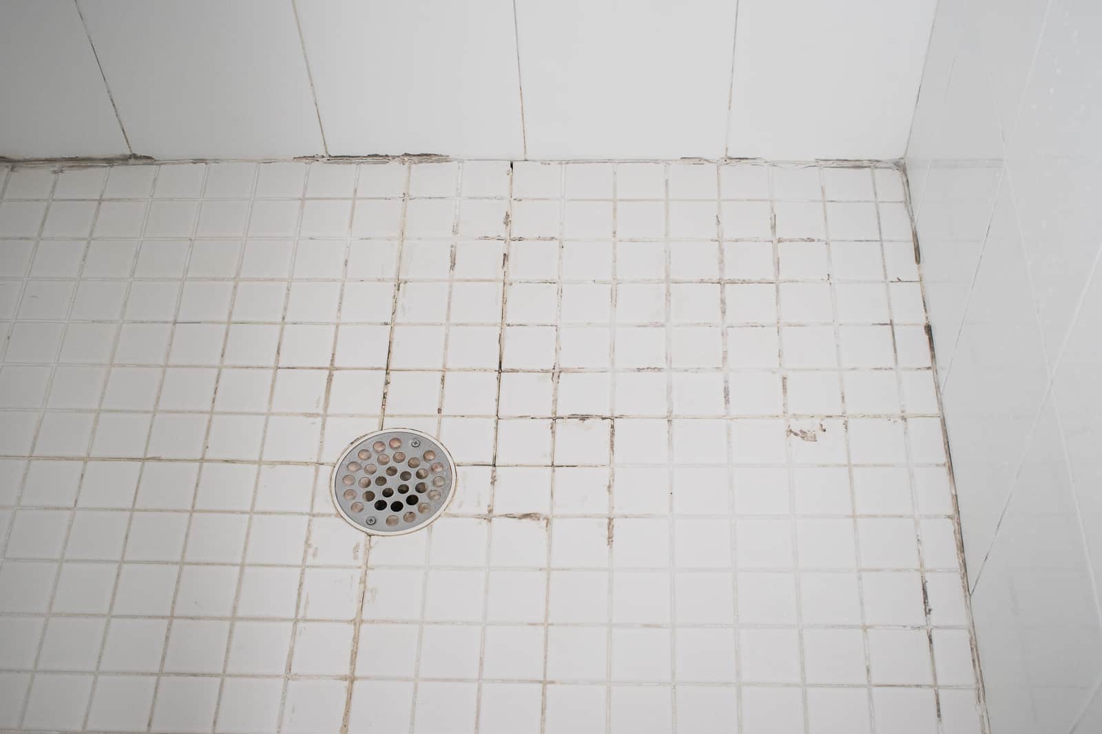 replacing-grout-on-a-shower-floor-at-charlotte-s-house