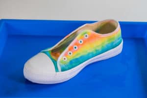 spray shoes with rubbing alcohol