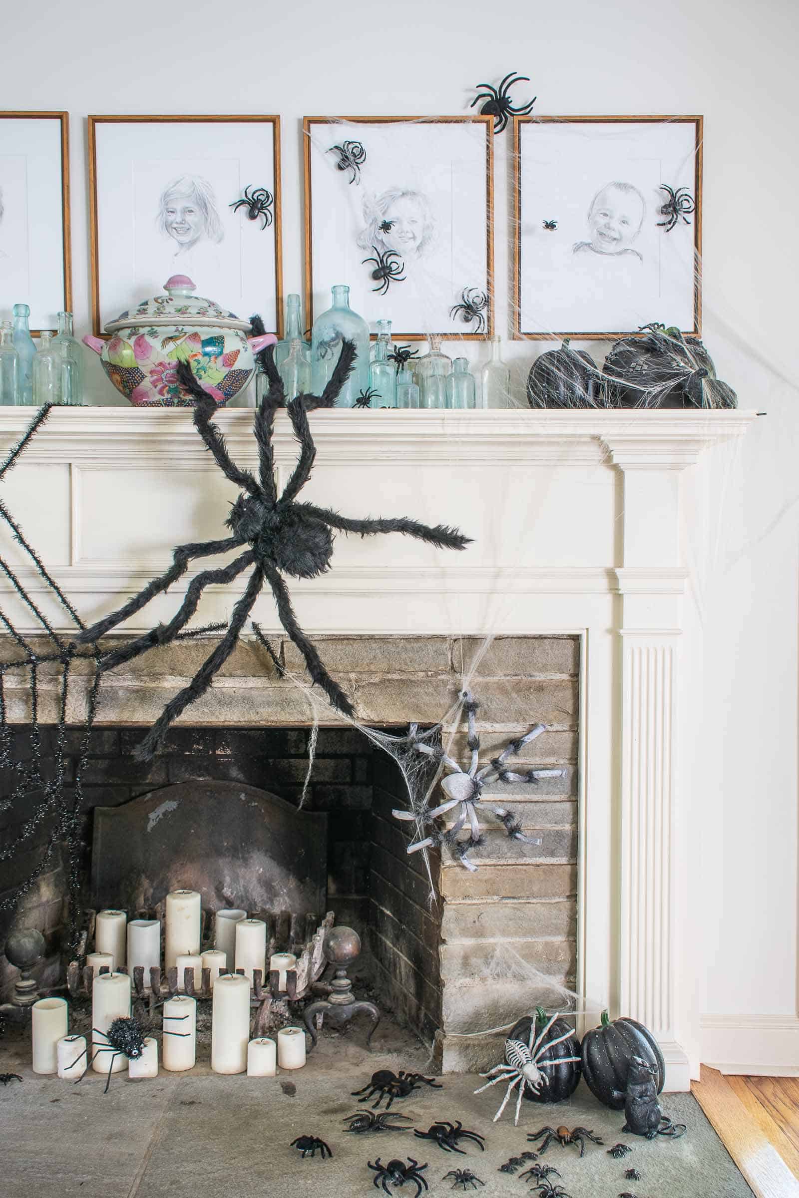 spiders on a halloween mantel