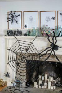 black spiderweb on halloween mantel