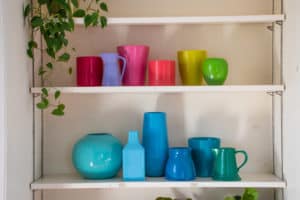 rainbow colored spray painted pottery
