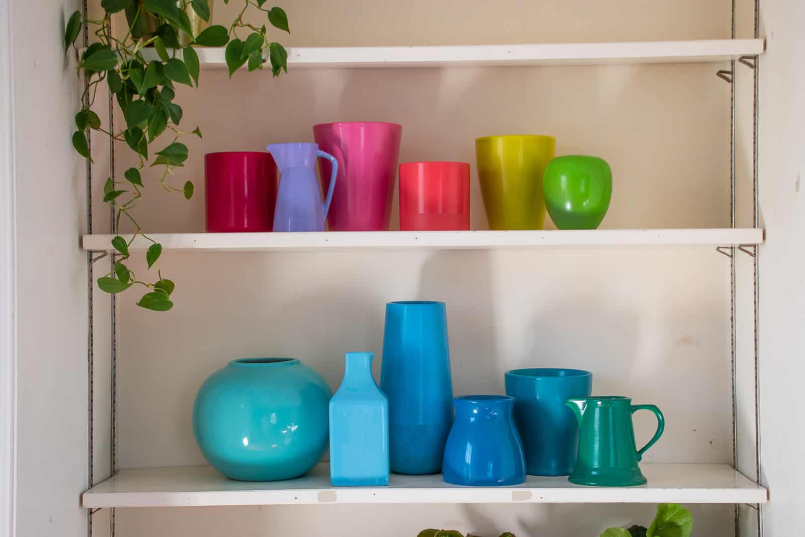 rainbow colored spray painted pottery