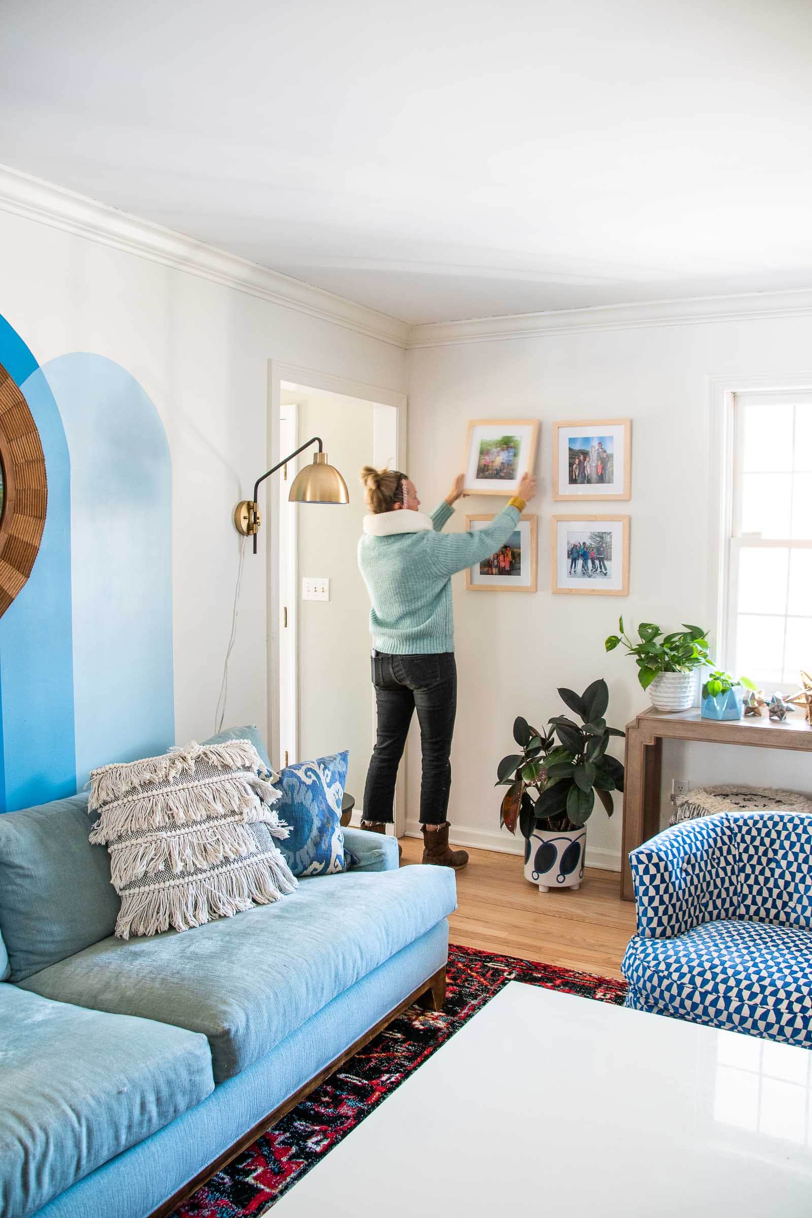 hanging gallery wall in family room