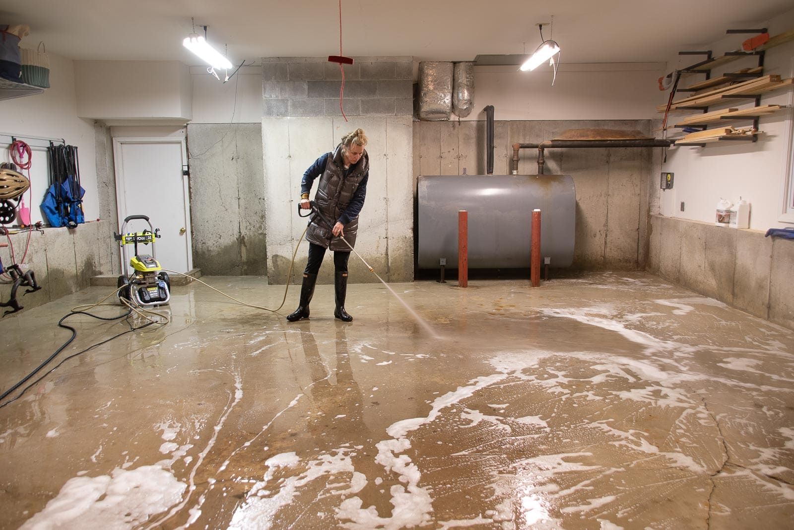 power washing and degreasing the garage