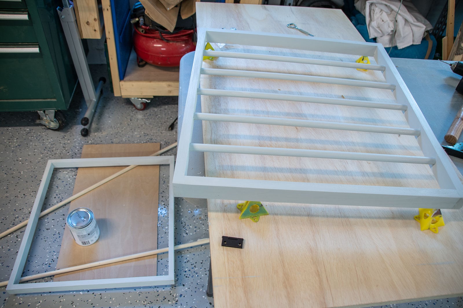 fill screw holes and paint drying rack