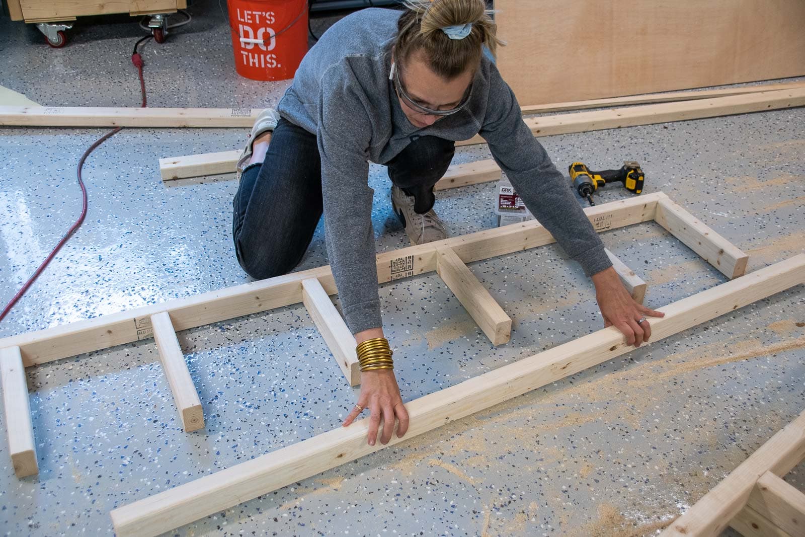 assemble shelves for laundry room