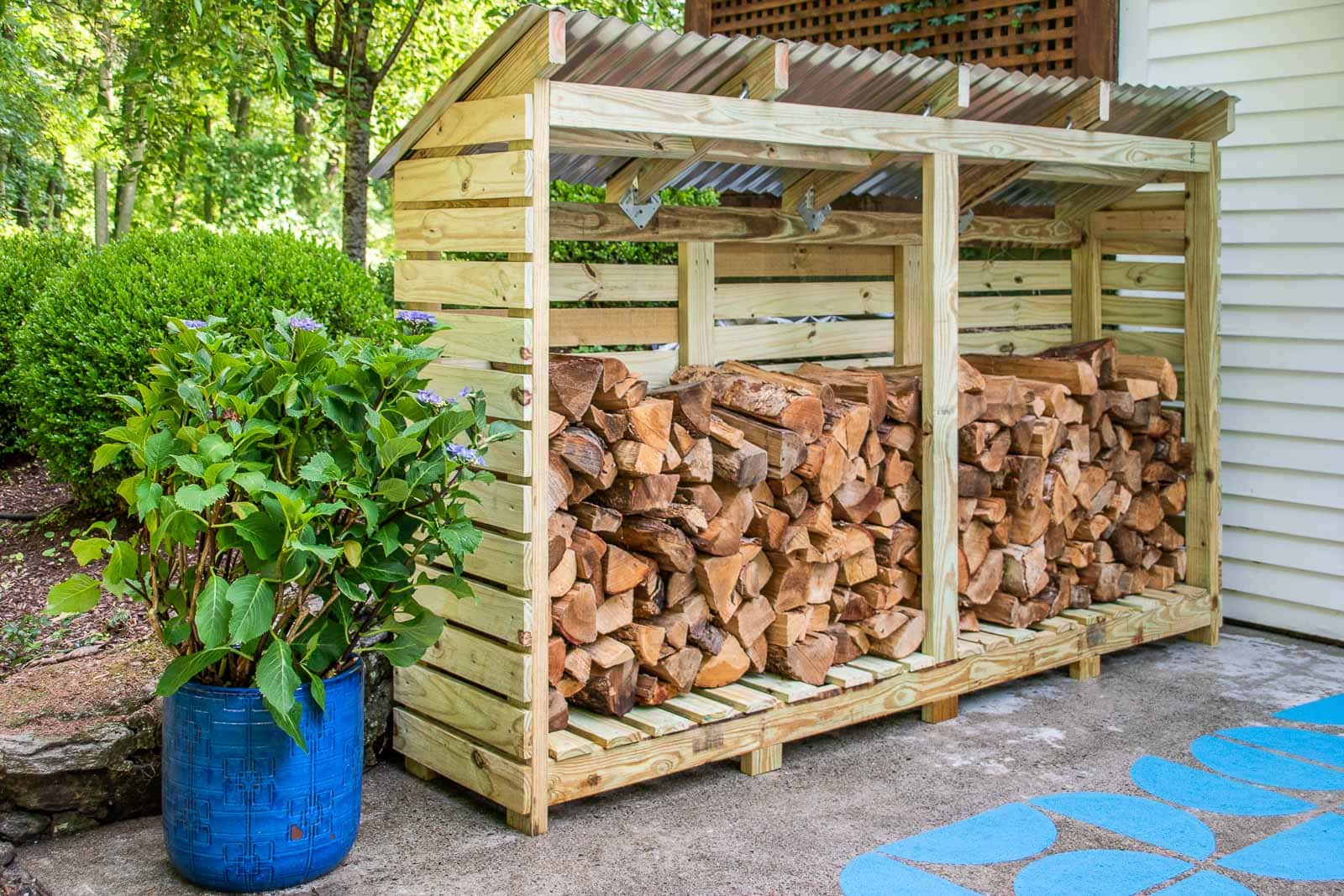 Firewood rack best sale with metal roof