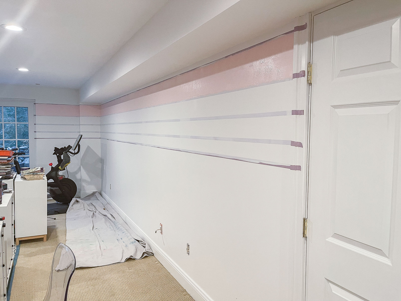 painting stripes on the wall