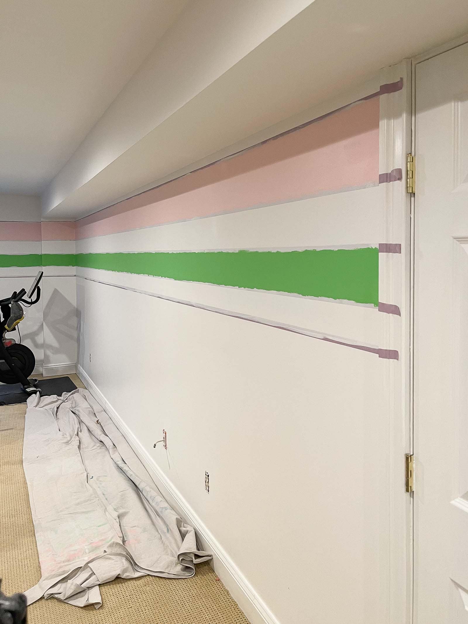 painting stripes on the wall