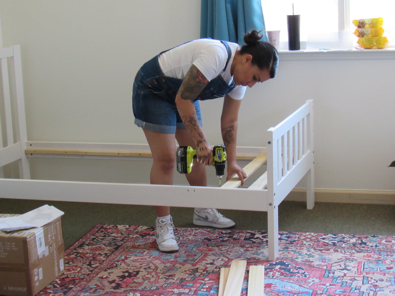 monica putting together a bed at shepherds gate