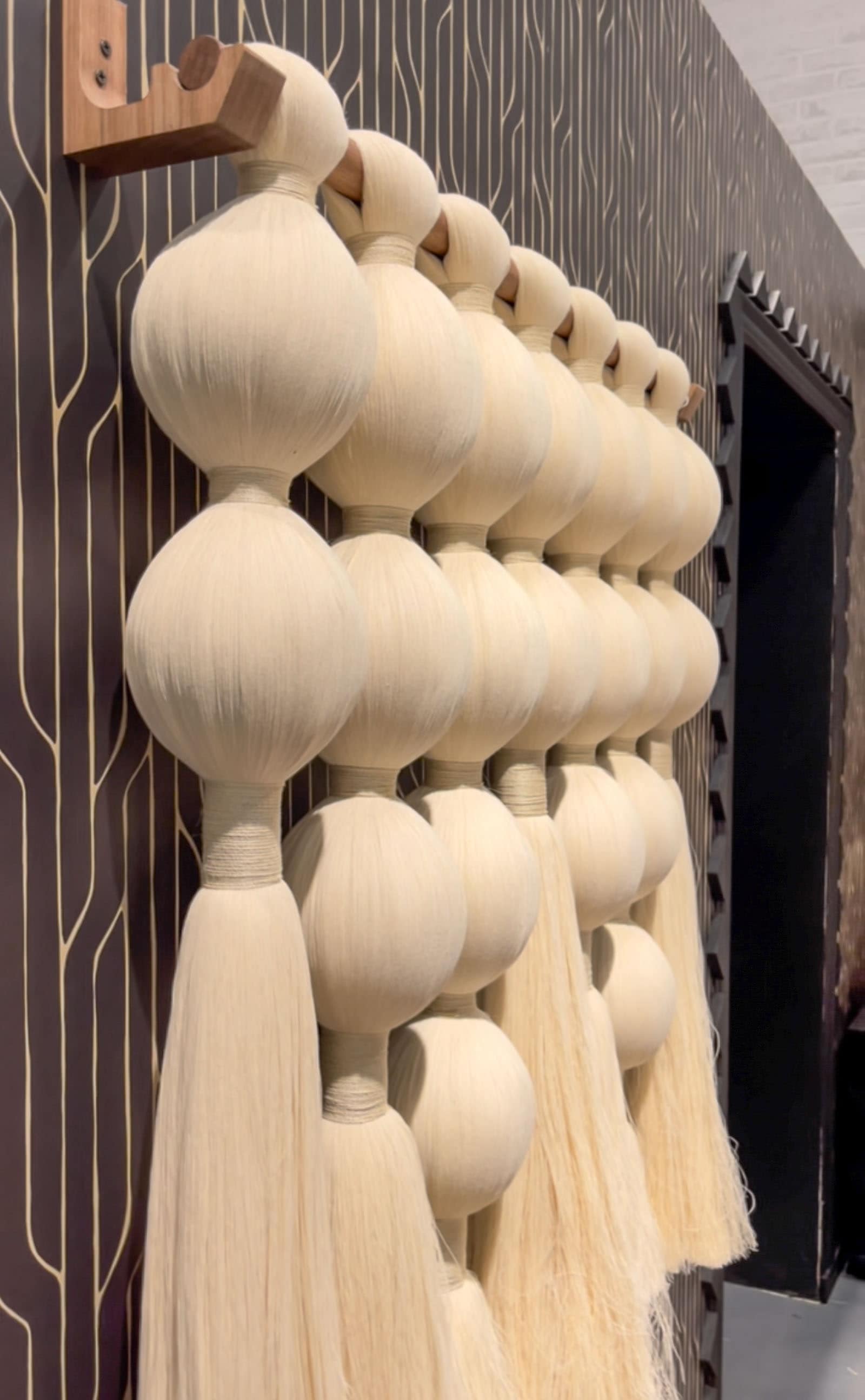 https://atcharlotteshouse.com/wp-content/uploads/2022/05/DIY-Yarn-Ball-Wall-Hanging-15.jpg