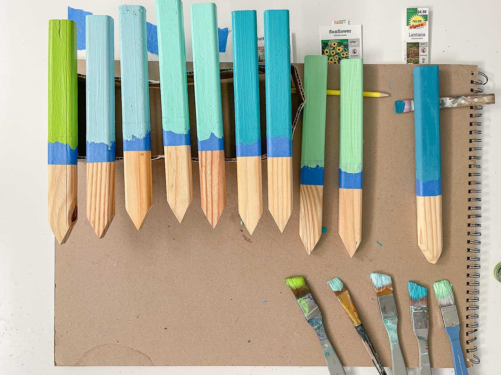 painting wooden garden stakes