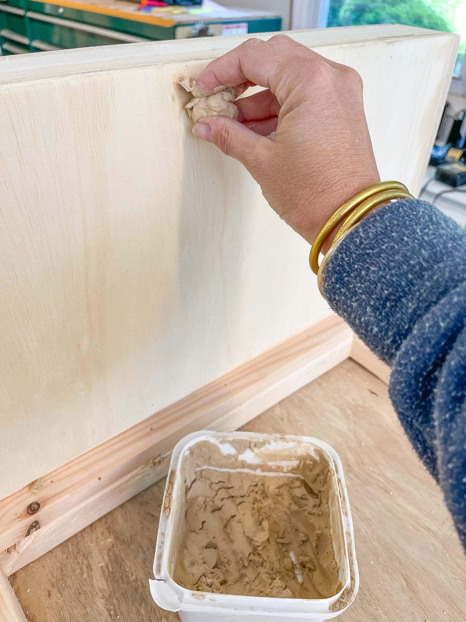 filling nail holes and sanding down table