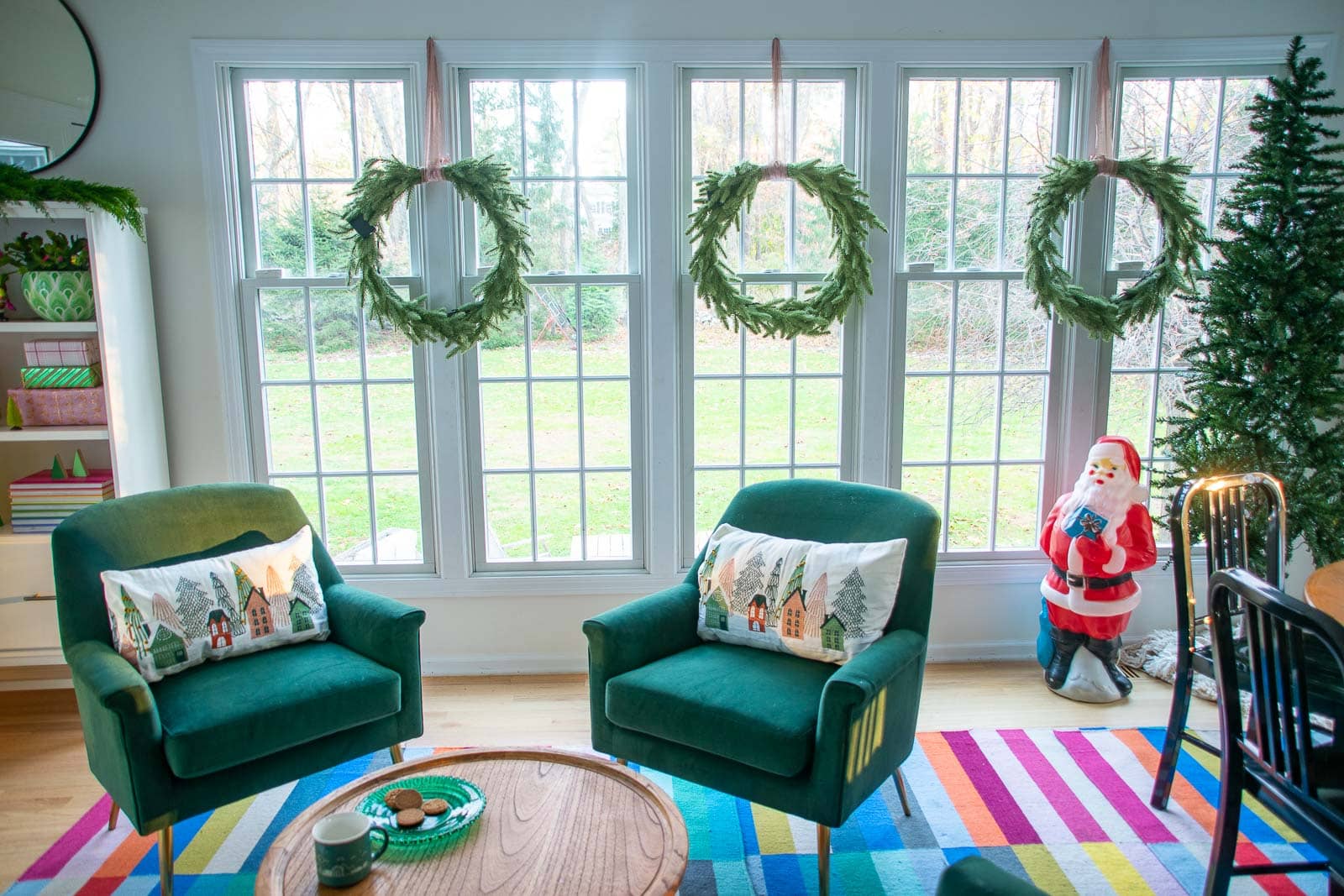 wreaths in colorful holiday sunroom