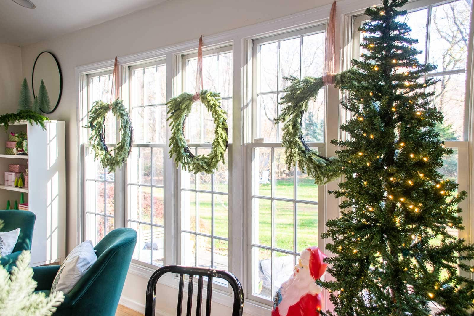 wreaths in colorful holiday sunroom