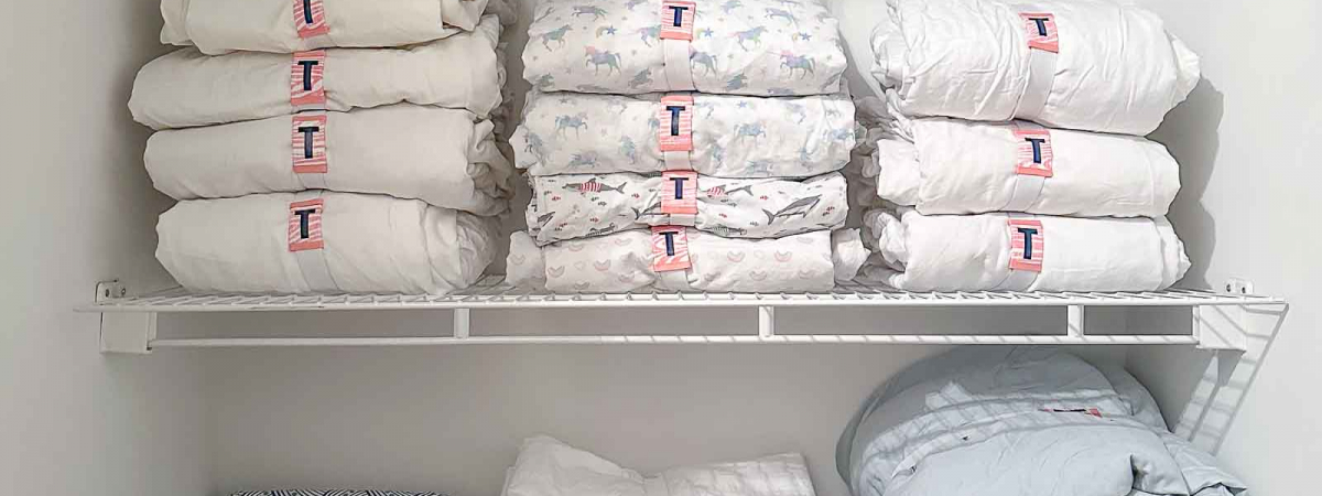 Organizing a Linen Closet with DIY Elastic Bands for Our Sheets