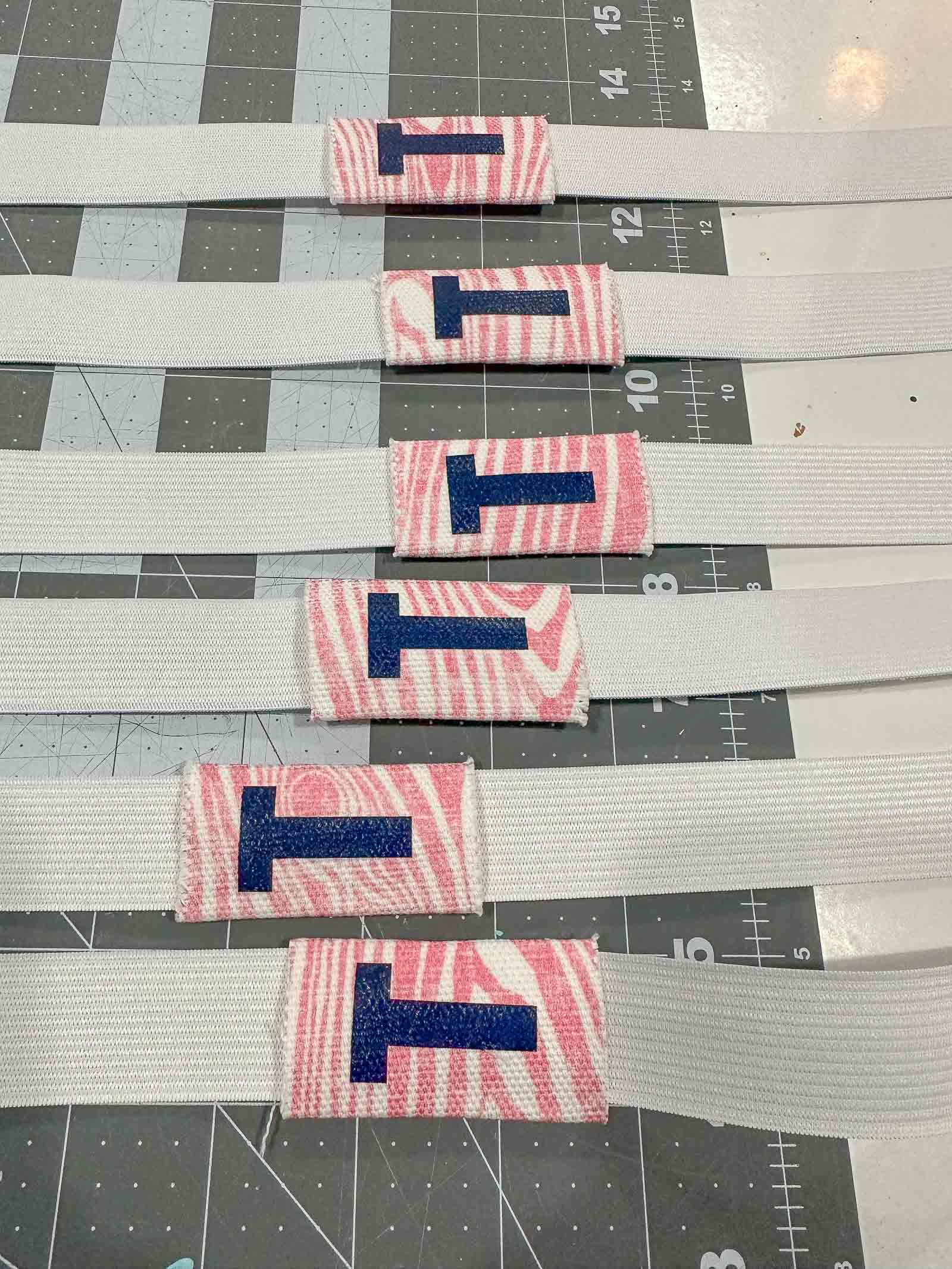 slide labels onto elastic