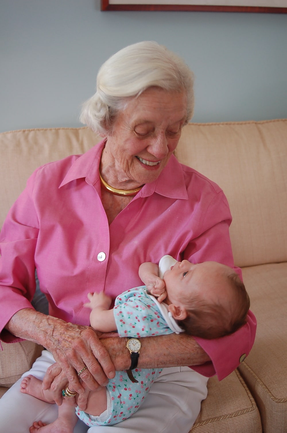 grandmother holding a child