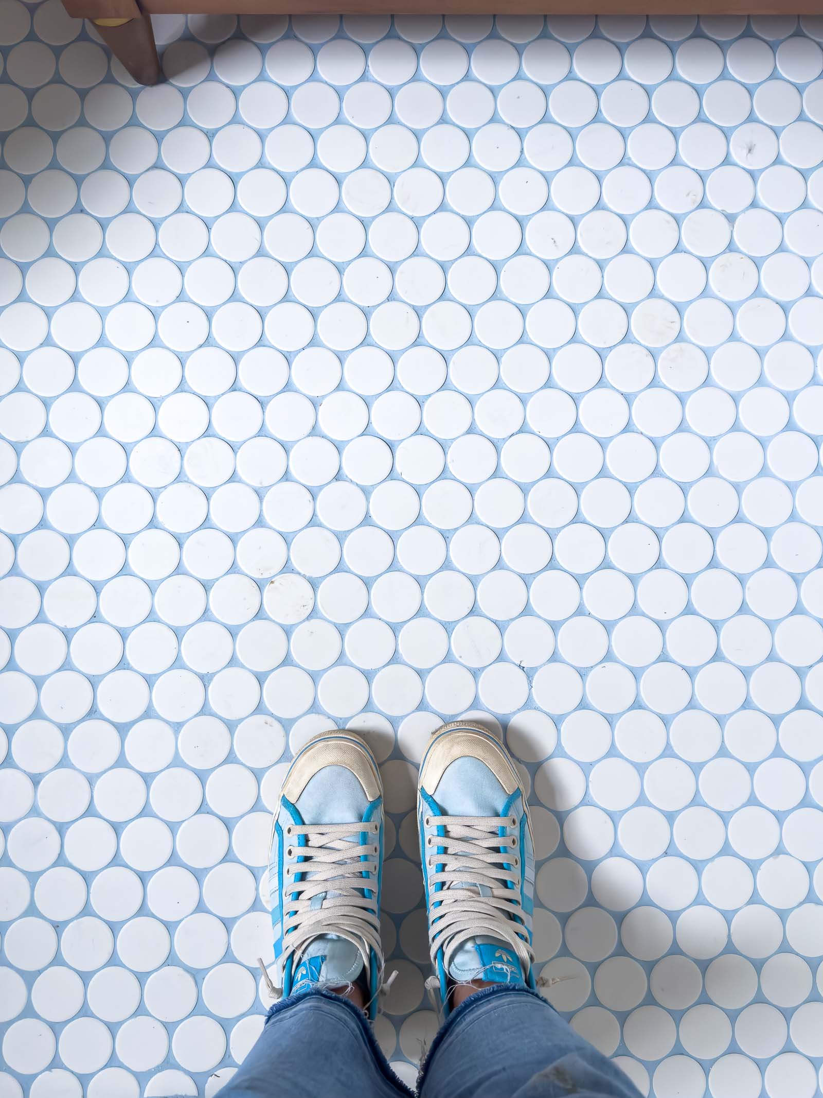 blue grout on white tiles