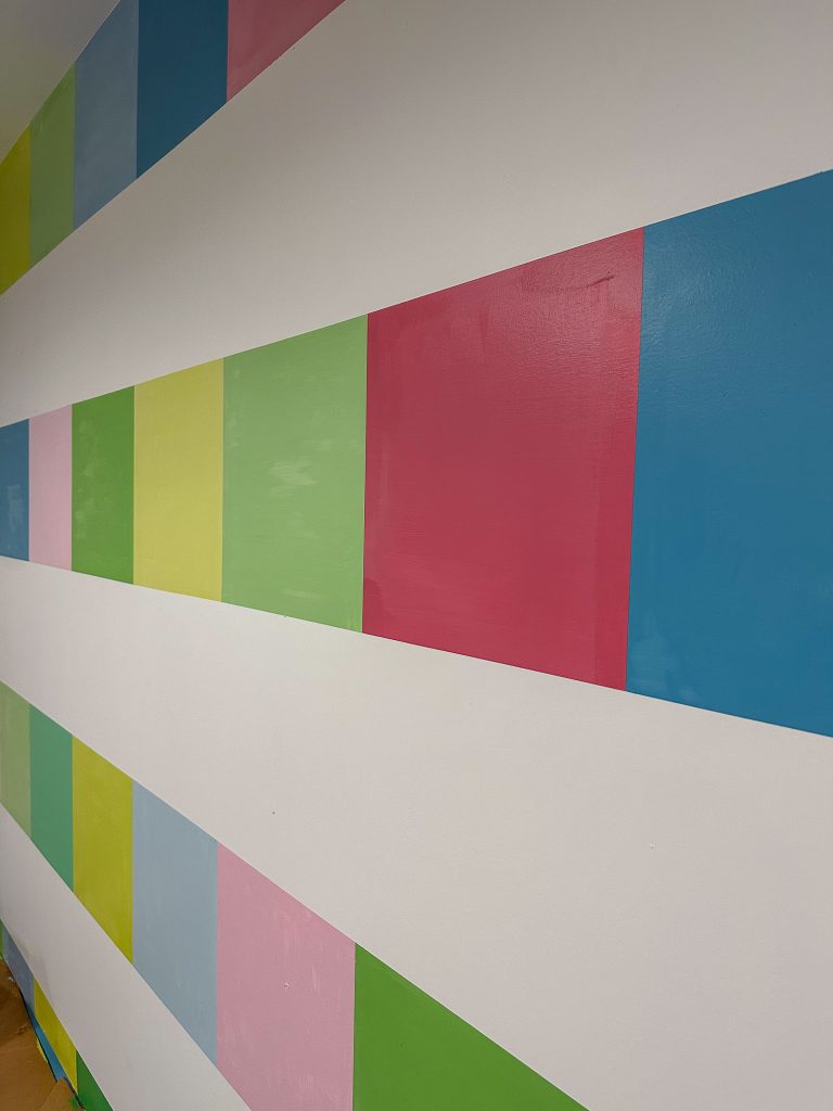 painting grid on mural wall
