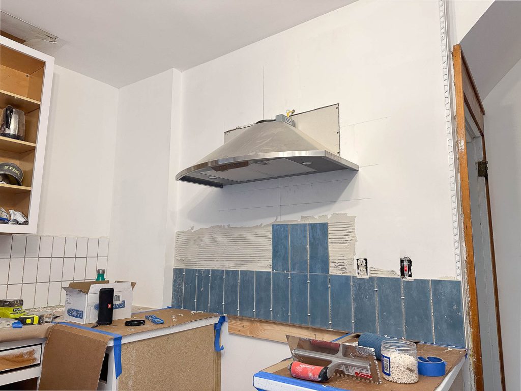 blue tile in flip house kitchen
