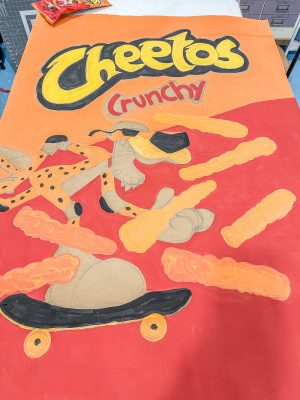 filling in the cheetos bag with paint