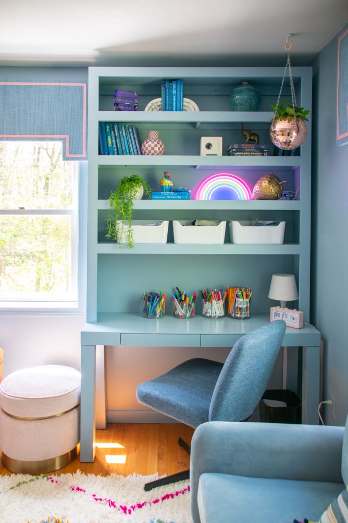 diy blue bookshelf in girls bedroom