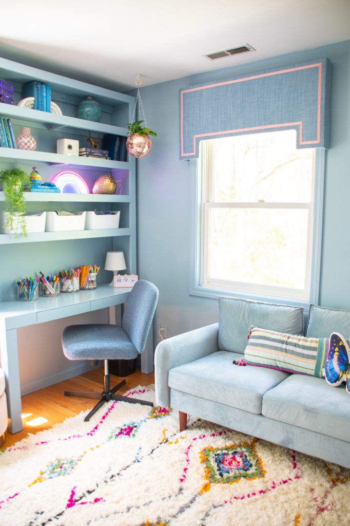 hanging planter with new blue loveseat in girls room makeover