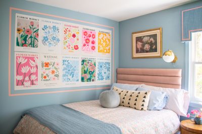 bedroom makeover with colorful art wall above the bed