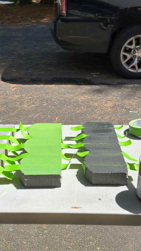paint the taped pattern on pavers