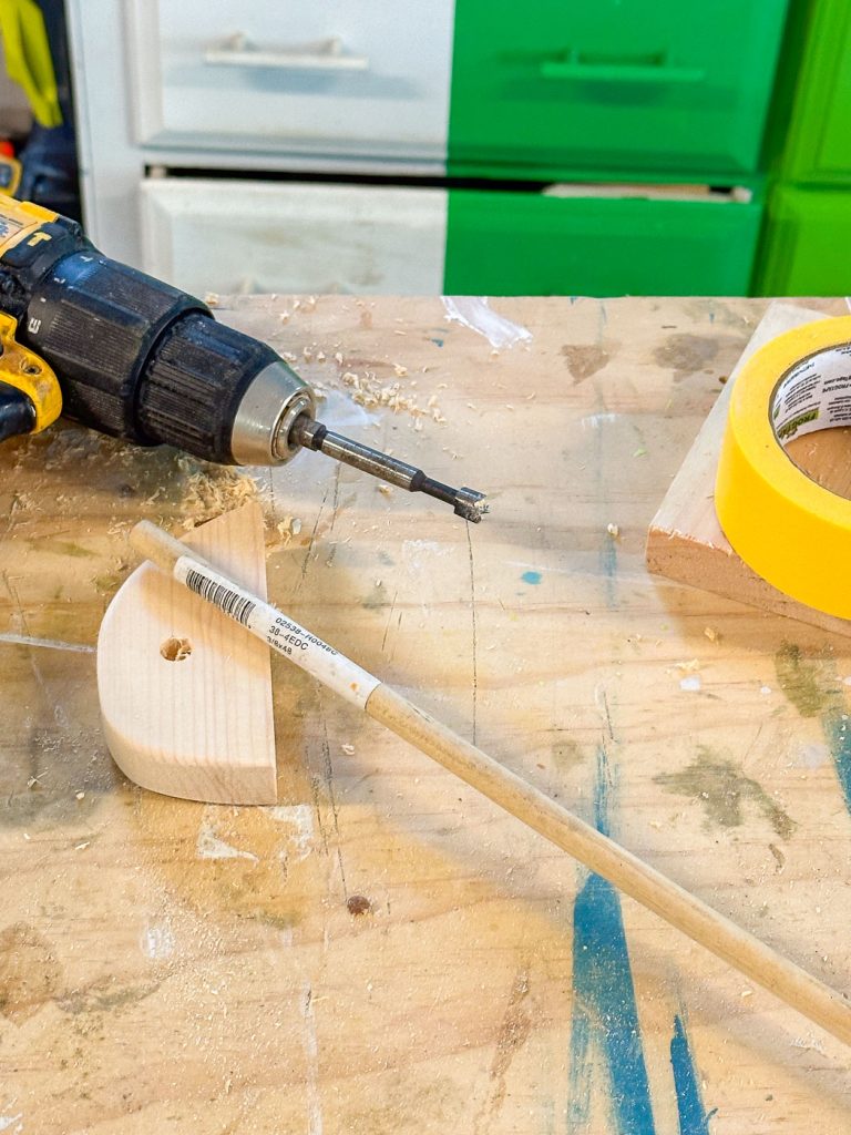 half circle mounting plates with wooden dowel to fit in the middle